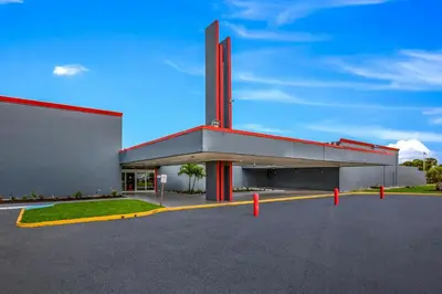 a rendering of a building with a parking lot at Hotel O Orlando Airport near Florida Mall in Orlando