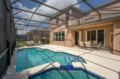 a swimming pool in a house with a glass ceiling at Disney Getaway Luxury Villa with Private Pool. Book Now BV75 in Kissimmee