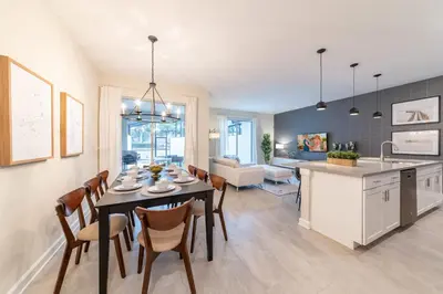a kitchen and dining room with a table and chairs at Disney Getaway Private Pool Themed Bedrooms. Book Now SLR377 in Kissimmee