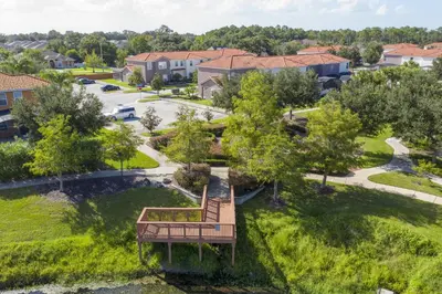 an overhead view of a park with a bench in a yard at Disney Getaway Private Pool Themed Bedrooms. Book Now BV241 in Kissimmee