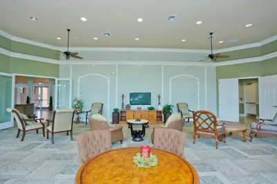 a living room with a table and chairs at Disney Getaway Private Pool Game Room. Book Now BV77 in Kissimmee