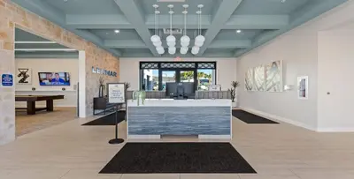 a lobby of a store with a reception desk in it at Disney Getaway Private Pool Themed Bedrooms. Book Now SLR505 in Kissimmee