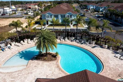 an overhead view of a swimming pool at a resort at Disney Getaway Private Pool Themed Bedrooms. Book Now WLV5 in Kissimmee