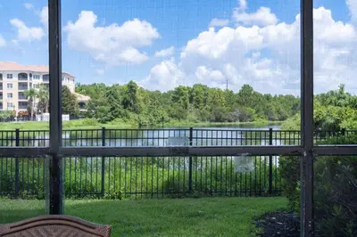 a view of a river from a screened in porch at WorldQuest Orlando Resort in Orlando
