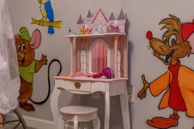 a play room with a castle on the wall at NEW 9Bdrm S. Facing Pool on Preserve near Dis/Univ in Kissimmee