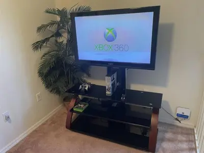 a flat screen tv sitting on top of a tv stand at Tranquil Waters Haven by Paradise Resort Vacations in Kissimmee