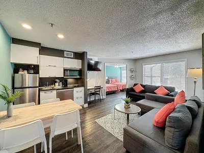 a living room with a couch and a table at Two bed condo in Parkway Palms Resort in Orlando