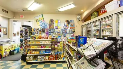 a store aisle with a grocery store with food and drinks at Beautiful Three bed condo, Minutes from Disney in Kissimmee