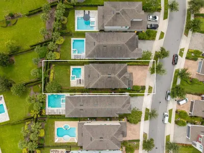 an overhead view of roofs of homes at 7416 Encore Reunion poolspa 11 guests 5 bdrs BBQ in Orlando