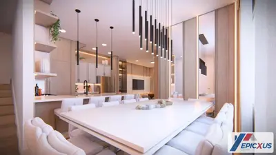 a dining room with a large white table and white chairs at The Epic San Diego Paradiso Grande Orlando in Orlando
