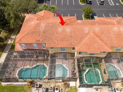 an aerial view of a house with an orange roof at Bright 3B w Pool Close to Disney Encantada 8545 in Kissimmee