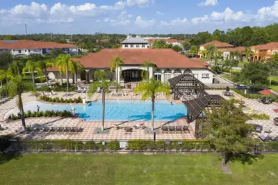 an aerial view of a resort with a swimming pool at Casa Bella Vida Resort Kissimmee in Kissimmee