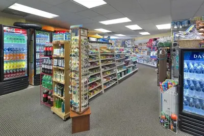 a store aisle of a grocery store with a lot of products at Apartamento Moderno 2 Quartos The Enclave in Orlando
