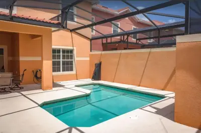 a swimming pool in the middle of a building at Disney & Resort Fun Private Pool Renovated in Kissimmee