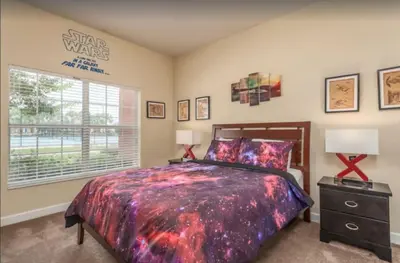 a bedroom with a king sized bed and a window at Disney & Resort Fun Private Pool Renovated in Kissimmee