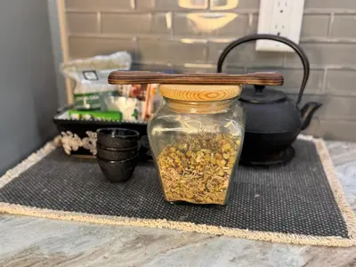 a mason jar with a wooden lid on top of it at Chic & Stylish 3BR-2BA Nature Lovers Home in Orlando