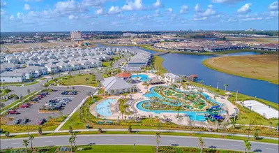 an aerial view of a resort with a water park at 4BR-3BA Townhouse with Private Pool in Storey Lake in Kissimmee