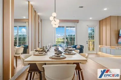 a dining room with a white table and chairs at The Epic New Jersey Vista Cay in Orlando