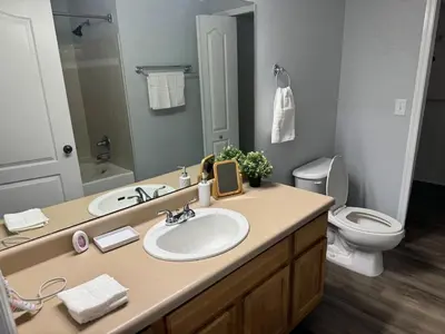 a bathroom with a sink and a toilet at Bellavue Getaway in Kissimmee