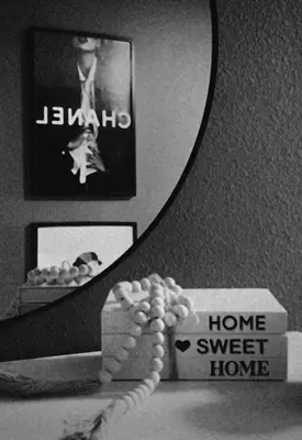 a mirror reflection of a hand holding a box of peanuts at Last Minute Disney Luxury Townhouse with Private Pool. Book Now SLR557 in Kissimmee