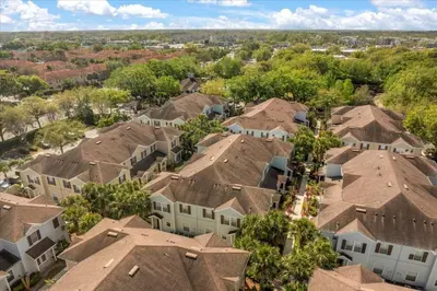 an aerial view of a residential neighborhood with houses at Townhome 4Q/3B perto da Disney -Lucaya Village in Kissimmee
