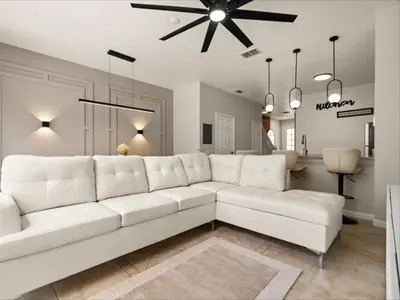 a white couch in a living room with a ceiling at 3 Bedrooms 3 Bathrooms Windsor Palms 2318Sp in Kissimmee