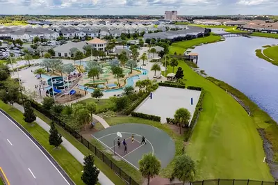 an aerial view of a park with a basketball court and water at Casa 4 Quartos c/ Piscina Privativa - Disney in Kissimmee