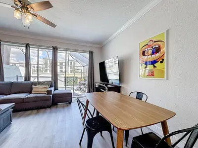 a living room with a table and a couch at T2531M Windsor Hills Resort 3Bedrm Private Pool in Orlando