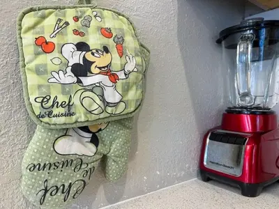 a mickey bag hanging on a wall next to a blender at 7742 WATER OAK KISSIMMIEE 4BED in Orlando