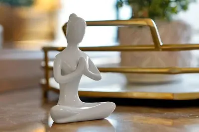 a small white figurine sitting on a table at 108 Stetson Court Kissimie in Kissimmee
