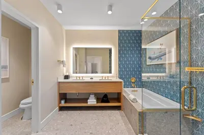 a bathroom with a sink and a tub and a shower at 8070-304 Luxury 2BR Apt Kissimmee Orlando Disney in Orlando