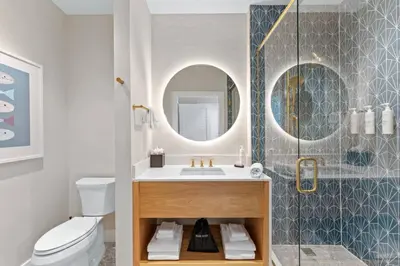 a bathroom with a sink and a mirror at 8070-304 Luxury 2BR Apt Kissimmee Orlando Disney in Orlando