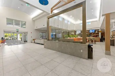 a lobby of a hospital with a large glass window at 8070-304 Luxury 2BR Apt Kissimmee Orlando Disney in Orlando