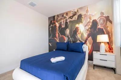 a bedroom with a painting of a star wars mural at Stylish Property with Private Pool in Orlando