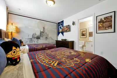 a bedroom with a hello kitty bed and a large mural at Windsor Hills Family Paradise in Orlando