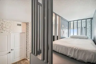 a bedroom with a bed and a window at Luxury Resort · Pool Lazy River in Kissimmee