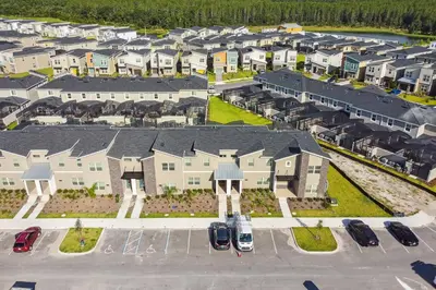 an aerial view of a large apartment complex at Disney Retreat · Pool Themed Bedrooms in Kissimmee