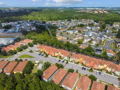 an aerial view of a residential suburb at Orlando Getaway w Heated Pool in Kissimmee