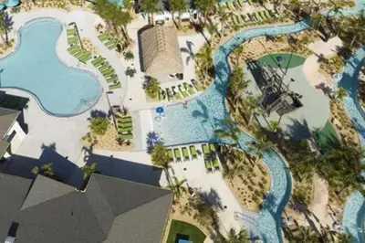 an aerial view of a pool at a resort at Orlando Retreat – 4BR Home Near Disney in Kissimmee