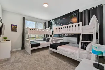 a bedroom with two bunk beds in it at Spacious Orlando Stay near Disney in Kissimmee