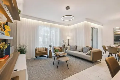 a living room with a couch and a table at Orlando Getaway – Minutes to Disney Parks in Kissimmee