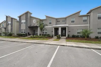 an empty street in front of a apartment building at Private Pool Luxury Resort Amenities in Kissimmee
