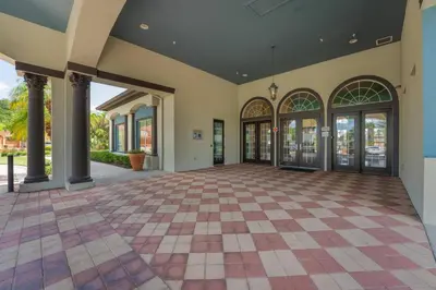 an empty lobby with a checkered floor at Family Townhome w Private Pool Orlando in Kissimmee