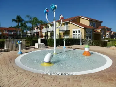 a small pool of water in a playground at Spacious Home · Near Disney Parks in Kissimmee