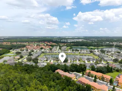 an aerial view of a park with a large white dot at Cozy No-Carpet Home Heated Pool Disney in Kissimmee