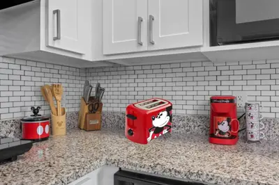 a kitchen counter with hello kitty appliances on it at 2 Bedroom Deluxe - Theme Park in Orlando