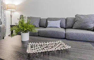 a living room with a couch and a rug at 3121#308- 3BR Condo 10min Disney 2 WaterParks in Kissimmee