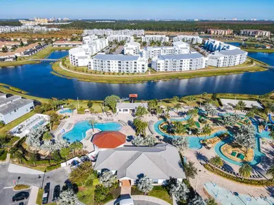 an aerial view of a resort with a pool at 3121#308- 3BR Condo 10min Disney 2 WaterParks in Kissimmee