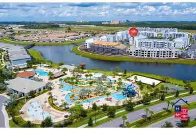 an aerial view of a resort with a water park at Vibrant Family Condo -10 Min From Disney in Kissimmee