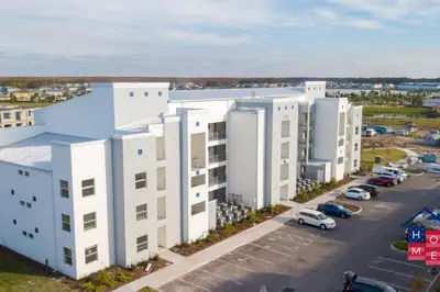 an aerial view of a large white building at Stunning Condo in the Heart of Orlando in Kissimmee